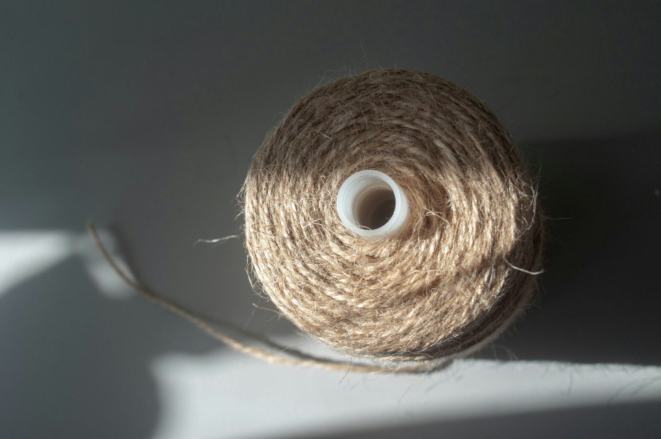 Close-up of a twine spool of natural fibre